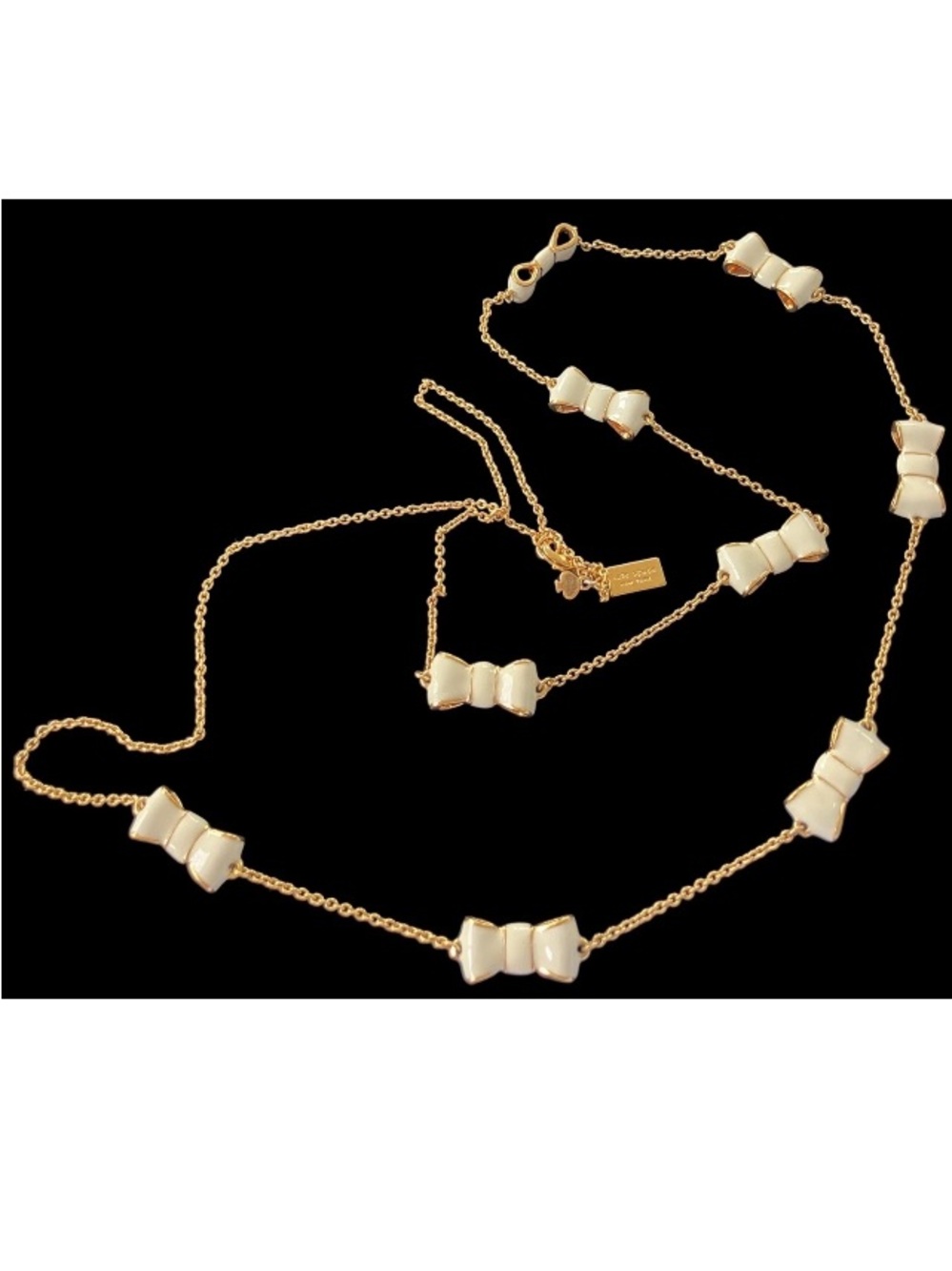 Kate Spade Cream Enamel Take a Bow Necklace Gold Tone 32”
